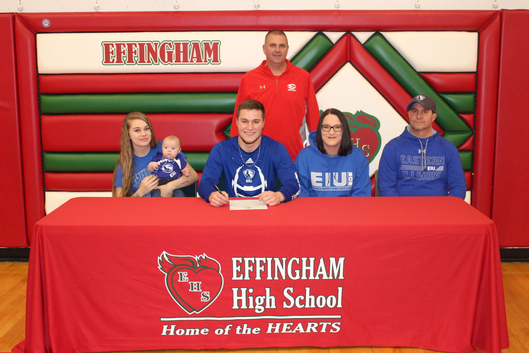 Logan Brown signing 20 Footbal at Eastern Ill University.JPG